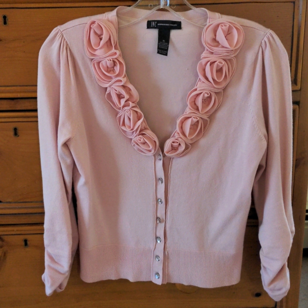 INC sweater in pale rose. Size medium. Hangs just the waist.